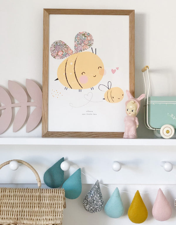 Liberty print Bumblee Bee wall art by The Charming Press on a shelf in kid's bedroom