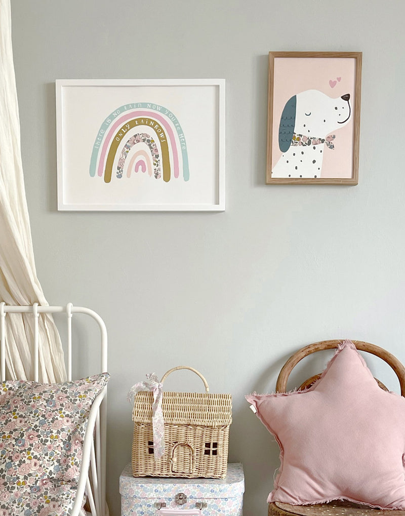 Gallery wall in children's bedroom featuring Rainbow art and Puppy Dog print by The Charming Press.