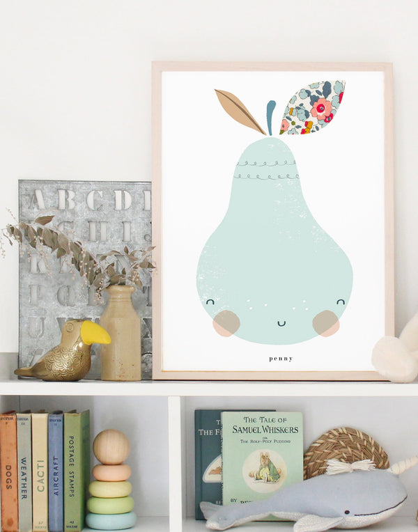 Liberty print Pair nursery art by The Charming Press shown on nursery shelf with kids' accessories. 