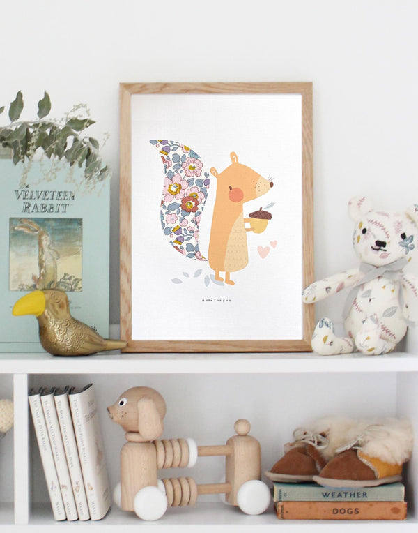Baby's nursery with Liberty print Squirrel art work by The Charming Press