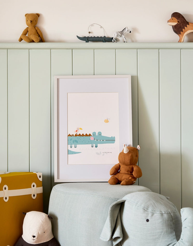 Crocodile nursery print by The Charming Press in child's bedroom. 