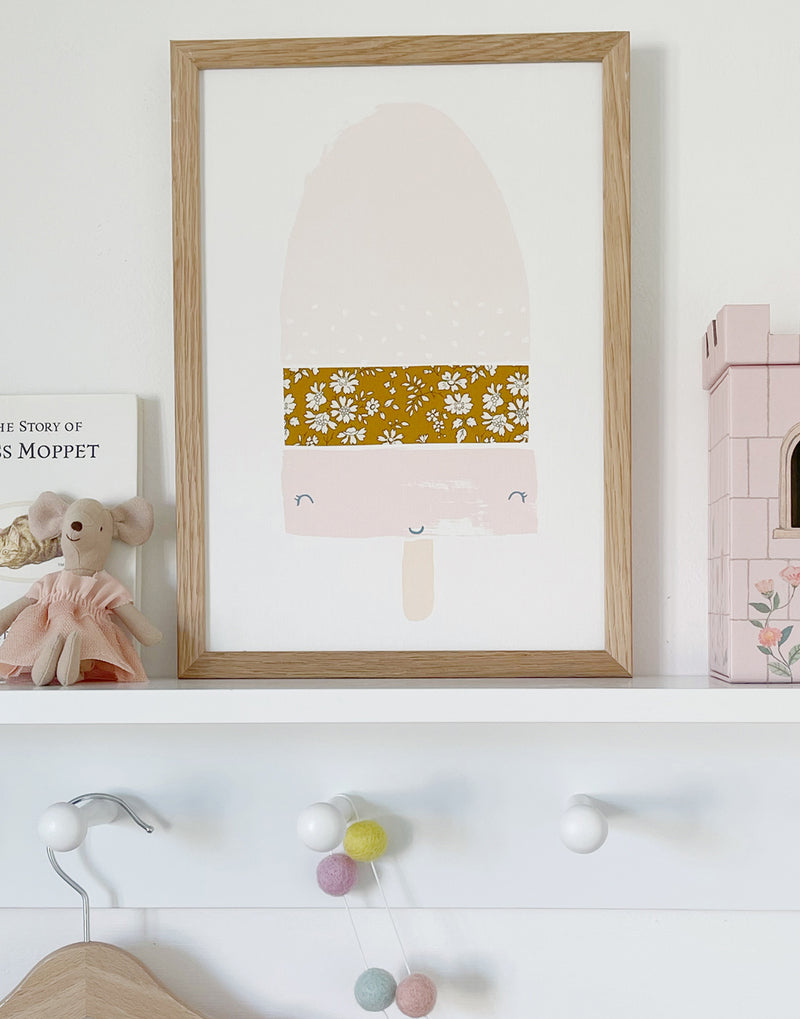 Playroom wall art featuring a Liberty print lolly by The Charming Press