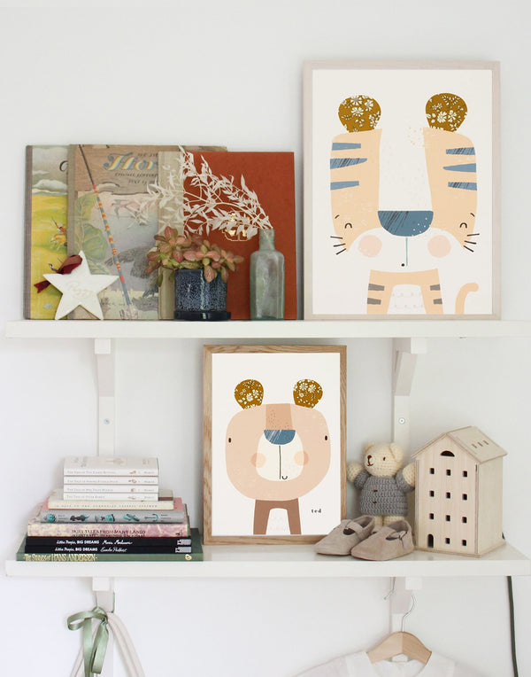 Kids' bedroom gallery wall showing Tiger and Bear Liberty print art by The Charming Press