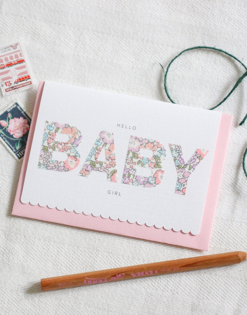 New baby greetings card featuring scallop edge and Liberty print lettering.