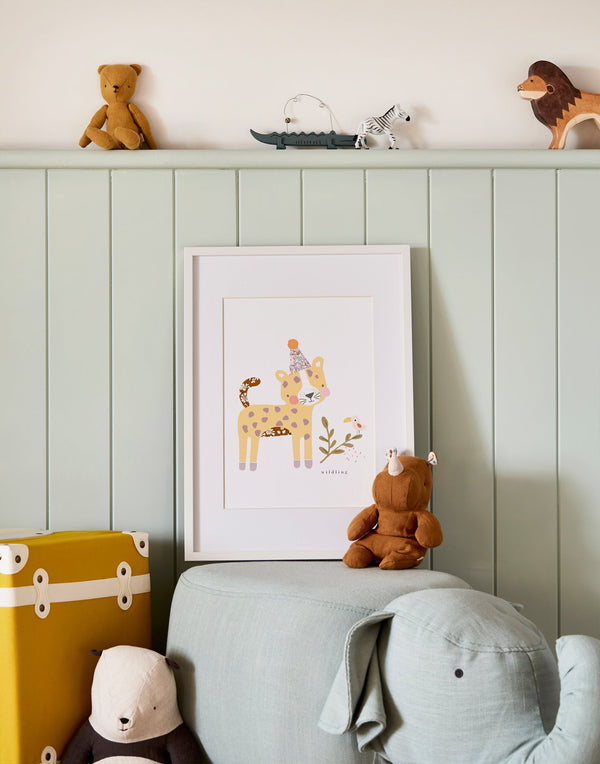 Liberty print Leopard nursery art by The Charming Press shown in baby's nursery