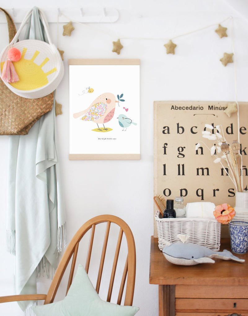 Liberty print Bird Nursery Art by The Charming Press hanging in child's bedroom.